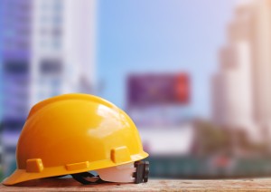 Safety helmet with construction site background